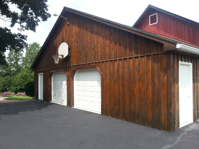 finished staining wood garage 